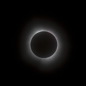 Totality with solar flares